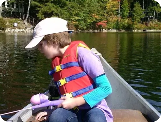 One of our guests canoeing and fishing on lake duncan.