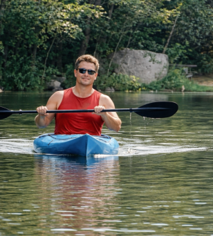 This shows one of our guests Kayaking on Lake Duncan