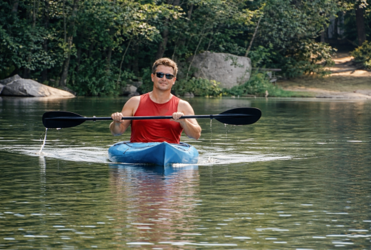 One of our guests kayaking on Lake Duncan. You have access to the lake from our campground.