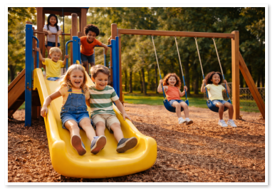 Kids playing on our playground here at Oak and Loon Campground.